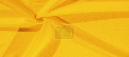 Foto de Seda amarilla. Liso elegante tela de seda de lujo amarillo se puede utilizar como un fondo abstracto con espacio de copia, de cerca. textura colorida - Imagen libre de derechos