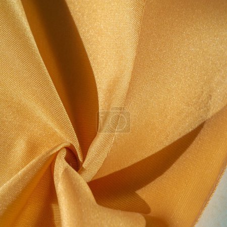 Photo for Silk fabric in yellow color. texture of colored silk fabric - can be used as a background - Royalty Free Image