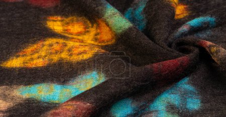 Black woolen fabric with beautiful butterfly print. Decor modern, textile art, texture, background, pattern