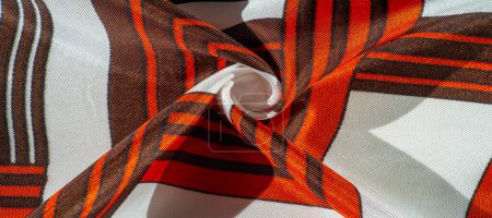 Photo for Texture, background, silk fabric with a striped pattern The design of this fabric is dedicated to the White Rabbit patchwork-style 'mosaic', presenting how a fairytale hero's vest could look like - Royalty Free Image