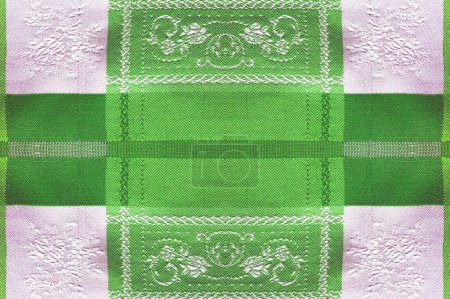 seamless green silk fabric. Smooth elegant green silk or satin luxury fabric texture can be used as an abstract background. Luxury background design. Texture, pattern
