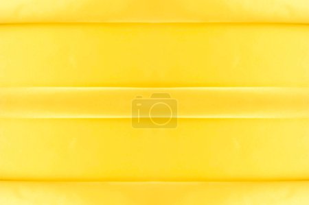 Hintergrund nahtlose Textur - gelbe Seide. Hochwertige Organza aus Seide in blassgelb ist ein außergewöhnlicher Stoff, schön für sich allein und als Accessoire in Bezug auf die Akzentuierung.
