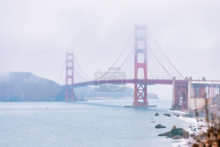 Photo for Golden Gate Bridge in the morning mist, San Francisco. Pastel colors, concept, travel, and attractions - Royalty Free Image