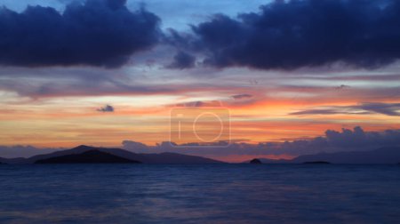 sunset on the beach. Seaside town of Turgutreis and spectacular sunsets. Selective Focus. Long Exposure shoot. tranquility scene.