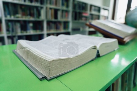 Photo for Large open book in the library on the tabl - Royalty Free Image