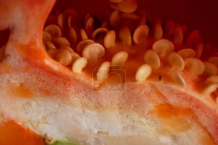 Foto de Red pepper with seeds, paprika, close up - Imagen libre de derechos