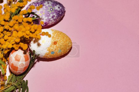 Photo for Mimosa    flower and  easter eggs, close up - Royalty Free Image