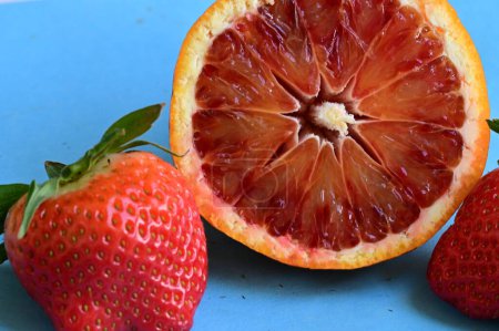 Photo for Close up of fresh strawberries and grapefruit - Royalty Free Image
