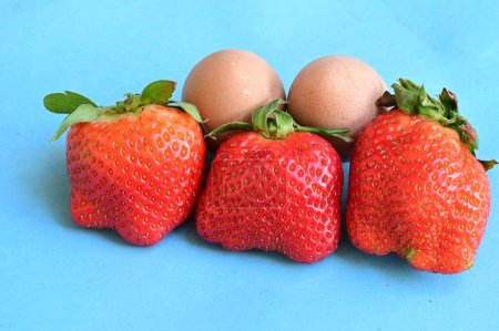 Photo for Strawberries and  easter eggs, close up - Royalty Free Image