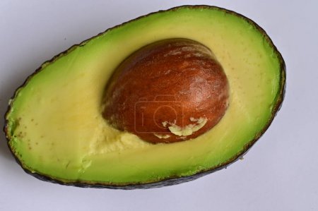 Photo for Halved avocado on a white background - Royalty Free Image