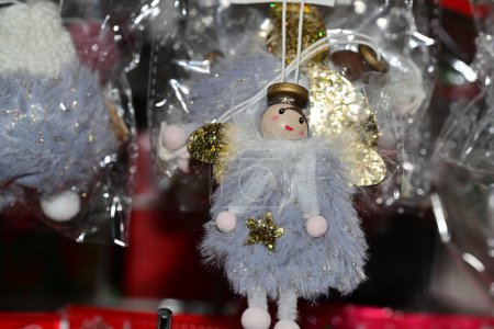 Photo for Christmas decoration, doll  on a festive  background - Royalty Free Image