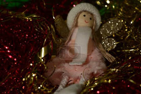 Photo for Doll decoration on  christmas tree - Royalty Free Image