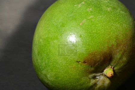 Photo for A green apple with a brown spot on it - Royalty Free Image