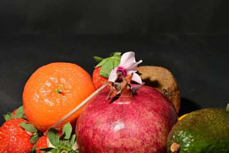 Photo for Assortment of fruits on a black background - Royalty Free Image