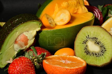 Photo for Variety of fruits on a black background - Royalty Free Image