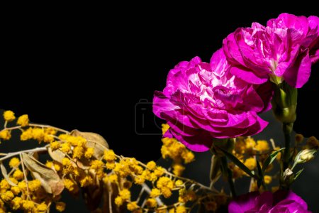 beautiful bouquet of flowers on black background  
