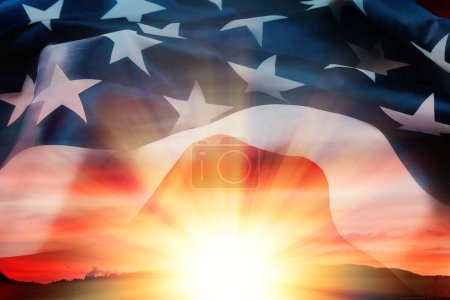 Photo for American national Holidays. Independence day, memorial day. Flag of USA waving at background with sunset and silhouette of mountain, double exposure. Concept of liberty, patriotism and pride. - Royalty Free Image