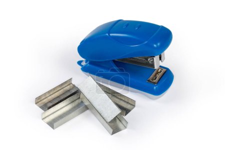 Photo for Small manual paper stapler and new spare staples for him on a white background - Royalty Free Image