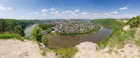 Photo for Scenic river loop of the Dniester river, flowing in the canyon valley near the town of Zalischyky, Ukraine. Panoramic view in summer day - Royalty Free Image