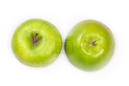Photo for Two green apples on a white background, view from two different sides - Royalty Free Image