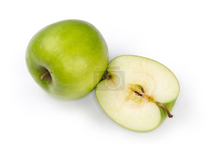 Photo for Half of the green apple and the same whole apple on a white background - Royalty Free Image