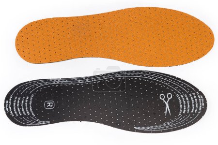 Latex insoles with genuine leather covering,  ability to cut to the desired size with size designation according to the standards of different regions, top view from both sides on white background