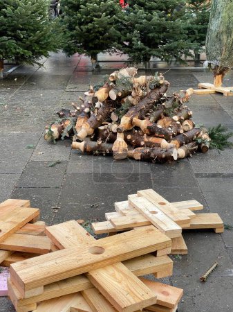 Photo for Chopped christmas tree wood pile on farmewrs market on holidays in the city - Royalty Free Image