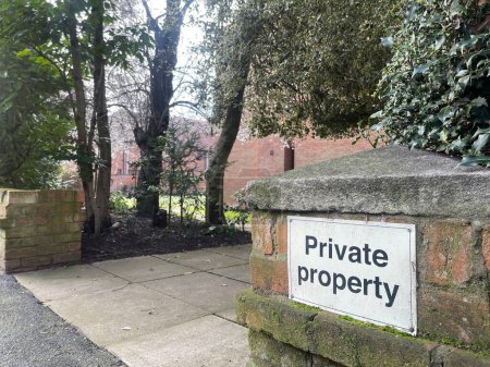 Photo for Private property sign on residential building brick wall - Royalty Free Image