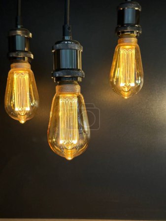 Photo for Vertical close up of  edison style vintage lightbulbs - Royalty Free Image