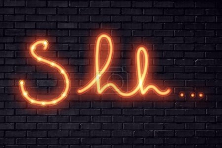 Photo for Shh... neon sign on black brick wall - Royalty Free Image