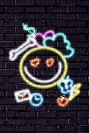 Photo for Neon symbols sign glowing on black brick wall. Smiley face with clock, message envelope, money and heart sign - Royalty Free Image