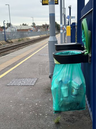 Photo for Vertical shot of recycling rubbish bags at train station - Royalty Free Image