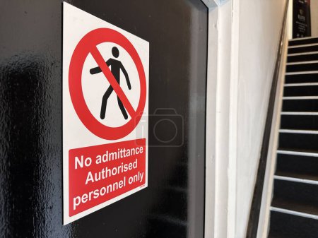 No admittance. Authorised personnel only sign on the door