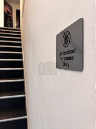 Photo for Vertical close up of authorised personnel only sign by the stairway - Royalty Free Image