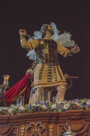 sculpture of a Roman in a Holy Week passage in Madrid