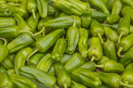 background with green Padrn peppers