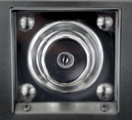 Téléchargez les photos : Keyholes. close up detail modern round metal key hole steel door, security safety protect - en image libre de droit