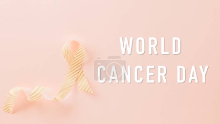 Foto de World cancer day concept. ribbons on pink background, cancer awareness, Banner design, healthcare support symbol - Imagen libre de derechos