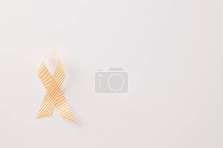Téléchargez les photos : Close up pink awareness ribbon of International World Cancer Day campaign isolated on white background with copy space, concept of medical and health care support, 4 February - en image libre de droit