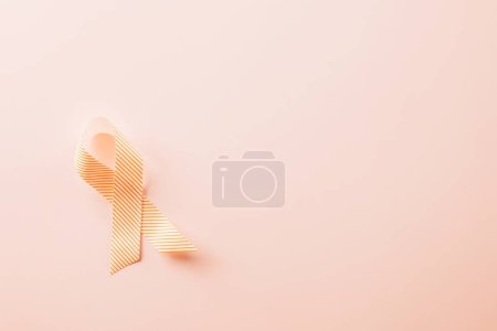 Téléchargez les photos : World cancer day concept February 4. ribbons on pink background, cancer awareness, Banner design, health support symbol, Healthcare and medical concept - en image libre de droit