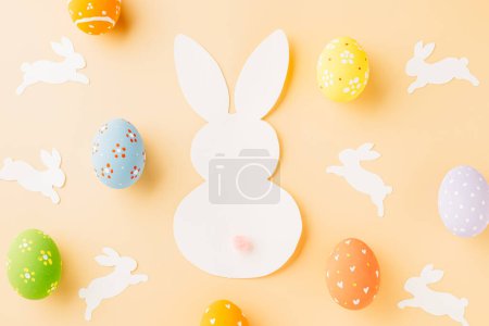 Photo for Easter eggs bunny and rabbit white paper cut isolated on pastel background copy space, Funny decoration, Creative composition banner web design holiday background, Happy Easter Day, flat lay top view - Royalty Free Image
