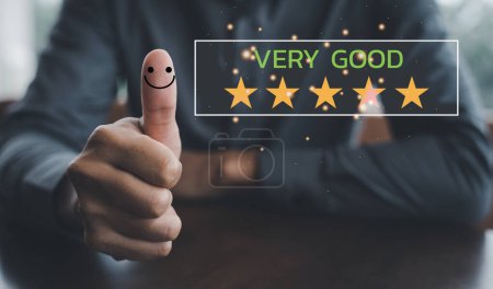 Photo for The power of customer satisfaction. A hand with a thumbs up and five-star icon, signifying positive feedback and excellent service. Perfect for digital marketing, reviews, and surveys - Royalty Free Image