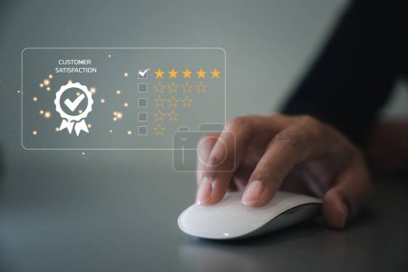Photo for Businessman clicking smile button on computer mouse for best evaluation and customer satisfaction concept, feedback rating 5 stars and positive customer review experience concept - Royalty Free Image