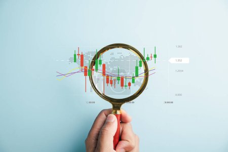 Photo for In hands ofskilled trader,magnifier glass becomestool for discovery and analysis, unveiling potential of stock markets bar graph for business investments. Technical price graph and indicator - Royalty Free Image