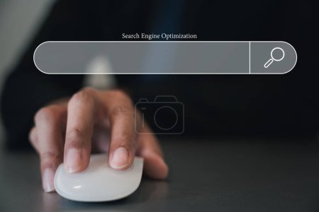 Photo for Technology Search Engine Optimization SEO. Business man holding white mouse on hand and 3D blank search bar, Searching internet browsing networking for data information, clicking internet - Royalty Free Image