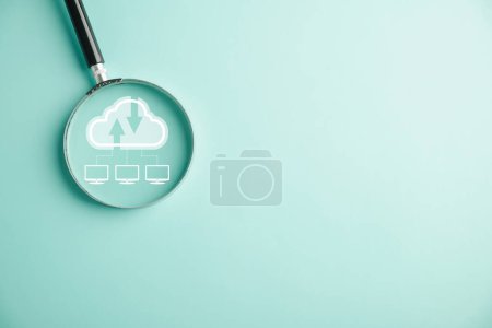 Photo for Magnifier glass focuses on cloud big data, representing modern communication and information technology. Innovative online backup with highly secured protection. Cloud computing concept is depicted. - Royalty Free Image