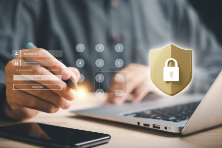 Photo for Network security and cybersecurity concept. Business professionals safeguard personal information with a shield. Encryption with a padlock icon on a virtual interface. Businessman touches the lock key - Royalty Free Image
