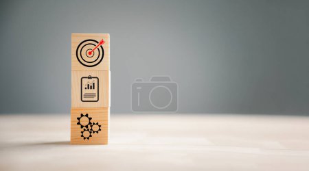 Photo for Wooden block step with Action Plan, Goal and Target icons. Success and business target concept. Company strategy and project management on a table. Teamwork benefits. - Royalty Free Image