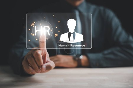 Modern HR Touchpoints, A businessman interacts with a virtual interface, highlighting the integration of technology in employee recruitment and career development. Embracing the power of digital touch