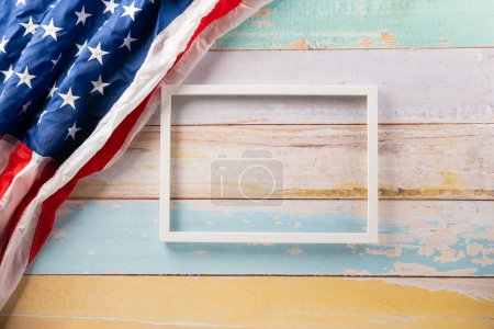 Foto de USA flag for Memorial day on abstract wooden background, Banner template design of presidents day concept, above flag of United States American with photo frame, Presidents Day, holiday background - Imagen libre de derechos